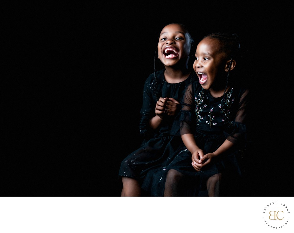 Joyful Moment: Award-Winning Sisters Sharing Laughter