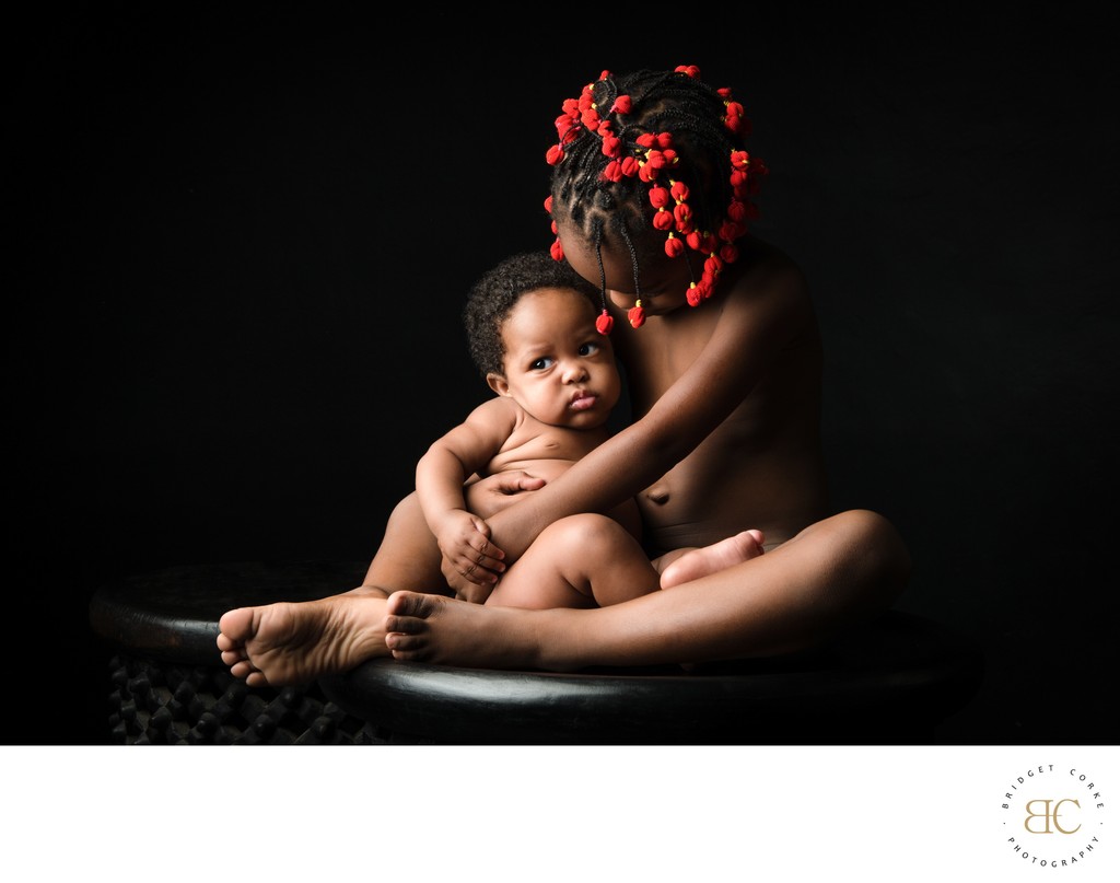 Tender Sibling Embrace: Award-Winning Cultural Portrait