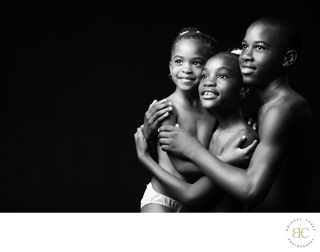 Loving Bond: Award-Winning Sibling Photo in Monochrome