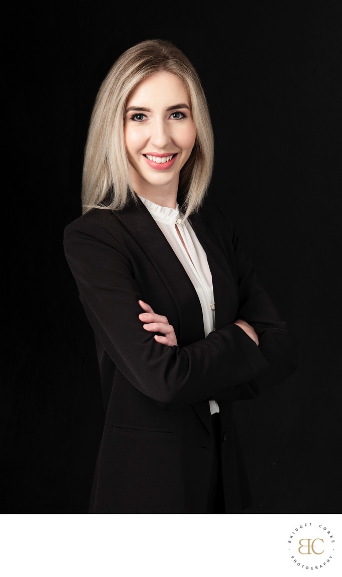 Confident Professional Headshot in Sleek Black Attire