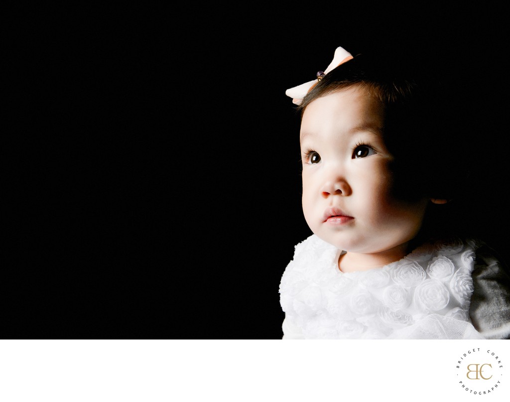 Innocent Wonder: Toddler in Thoughtful Gaze