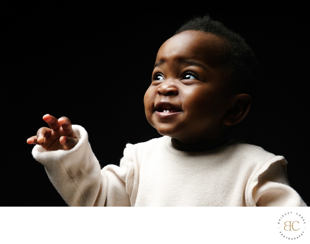 Glimpse of Joy: Baby’s Bright Expression