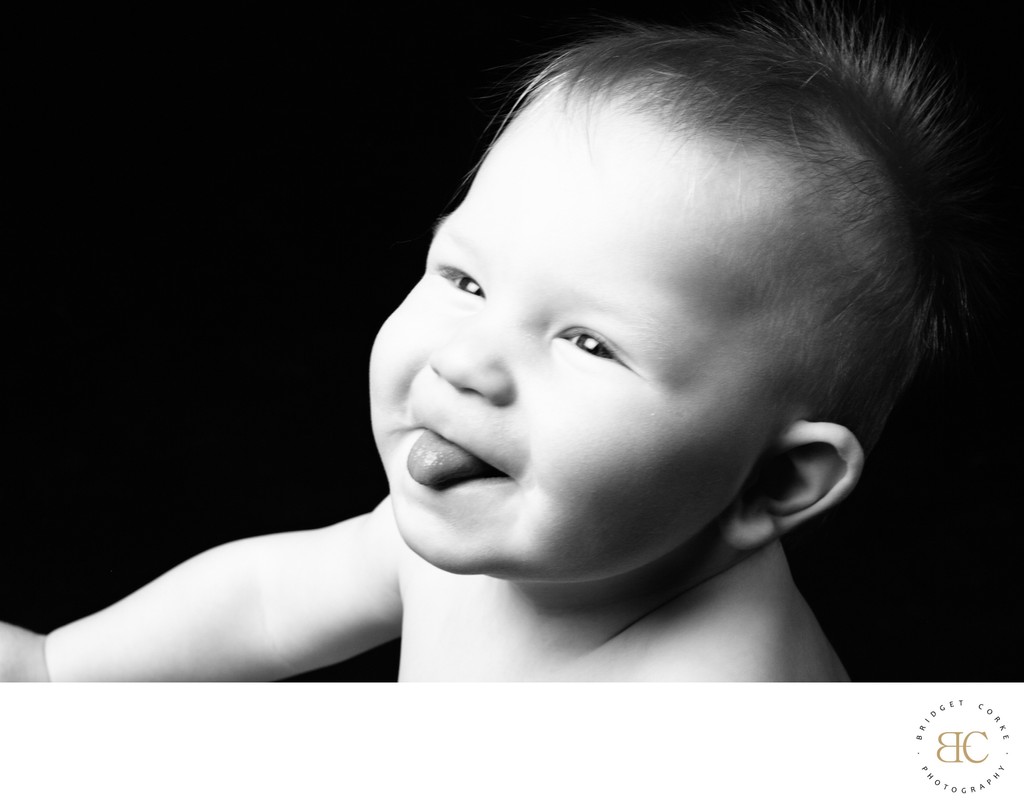 Playful Baby Expression in Black and White