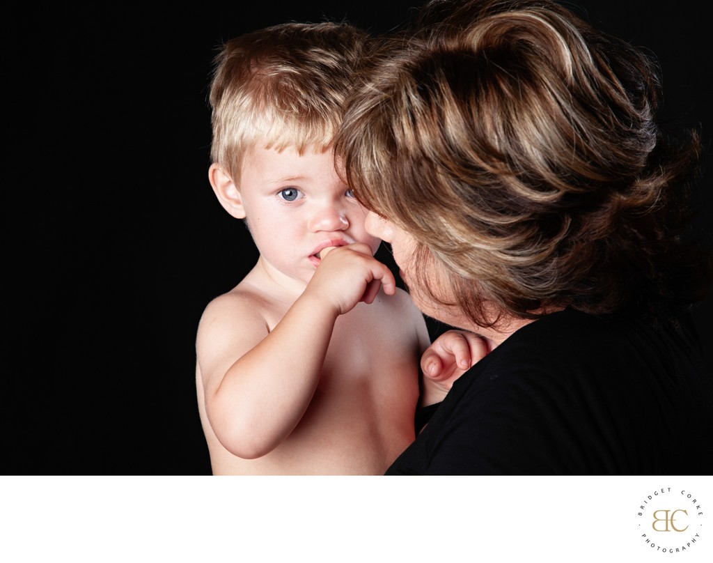 Protective Embrace Between Mother and Son
