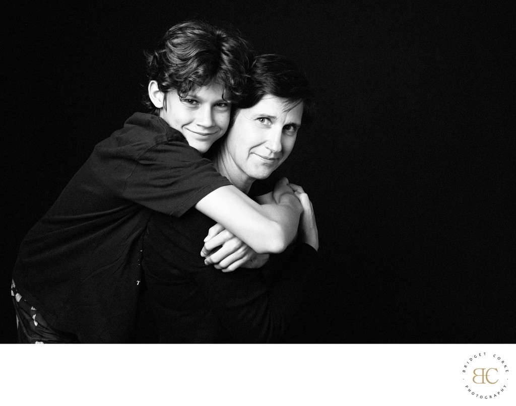 Mother Piggybacking Her Teen Son