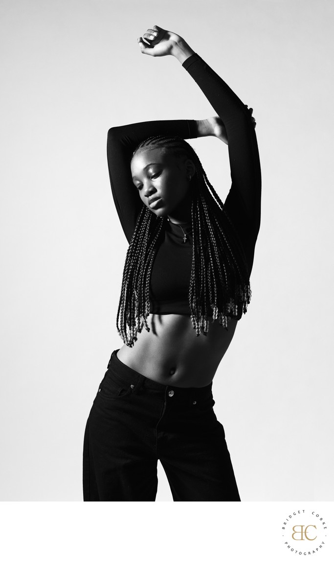 Monochrome Fashion Portrait with Raised Arms