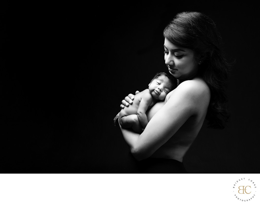 Mother’s Tender Newborn Portrait
