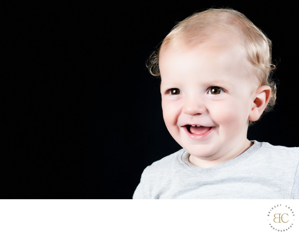 Smiling studio baby portrait in Johannesburg