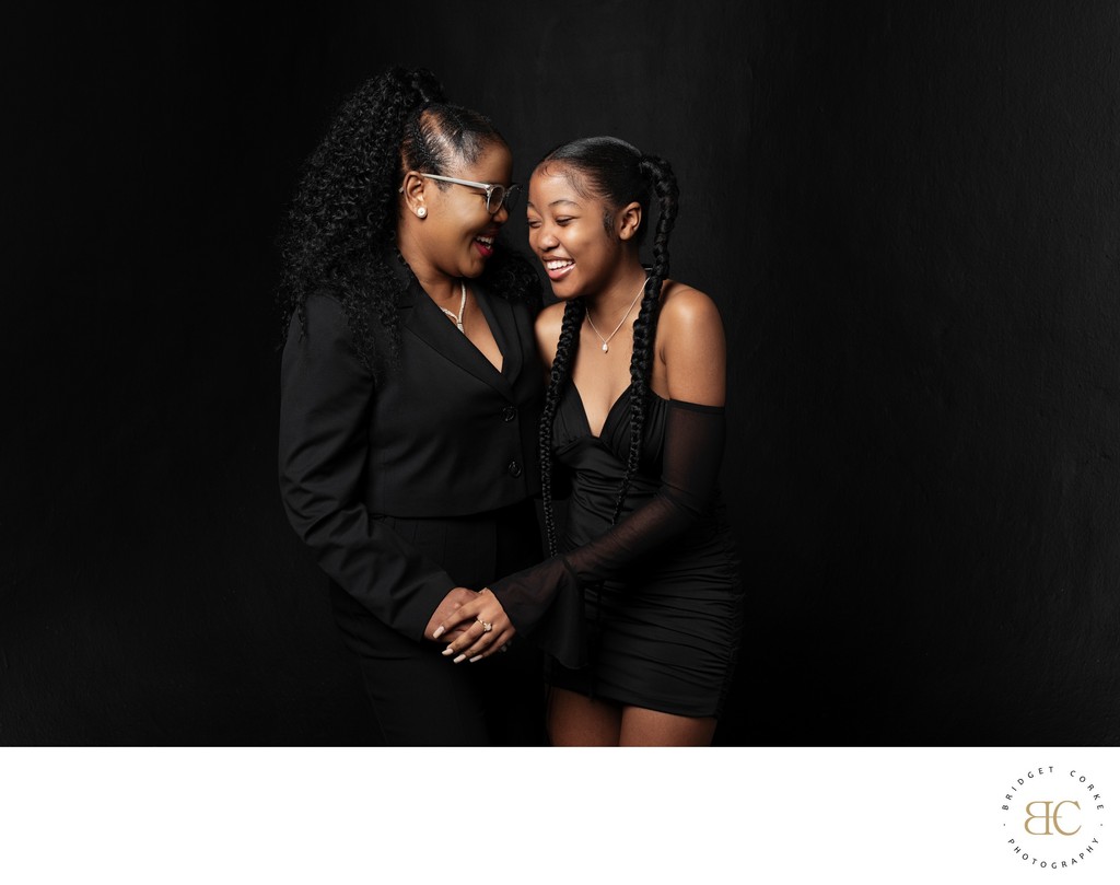 Mother and daughter beside becoming