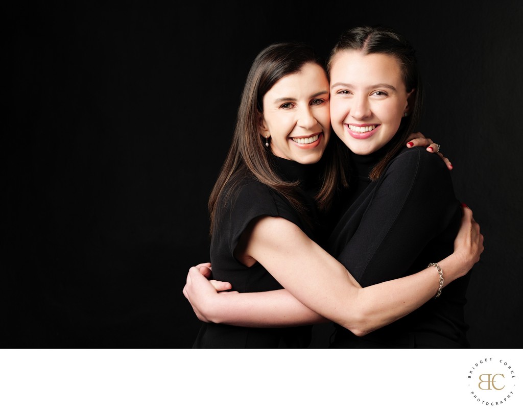 Mother and daughter held close