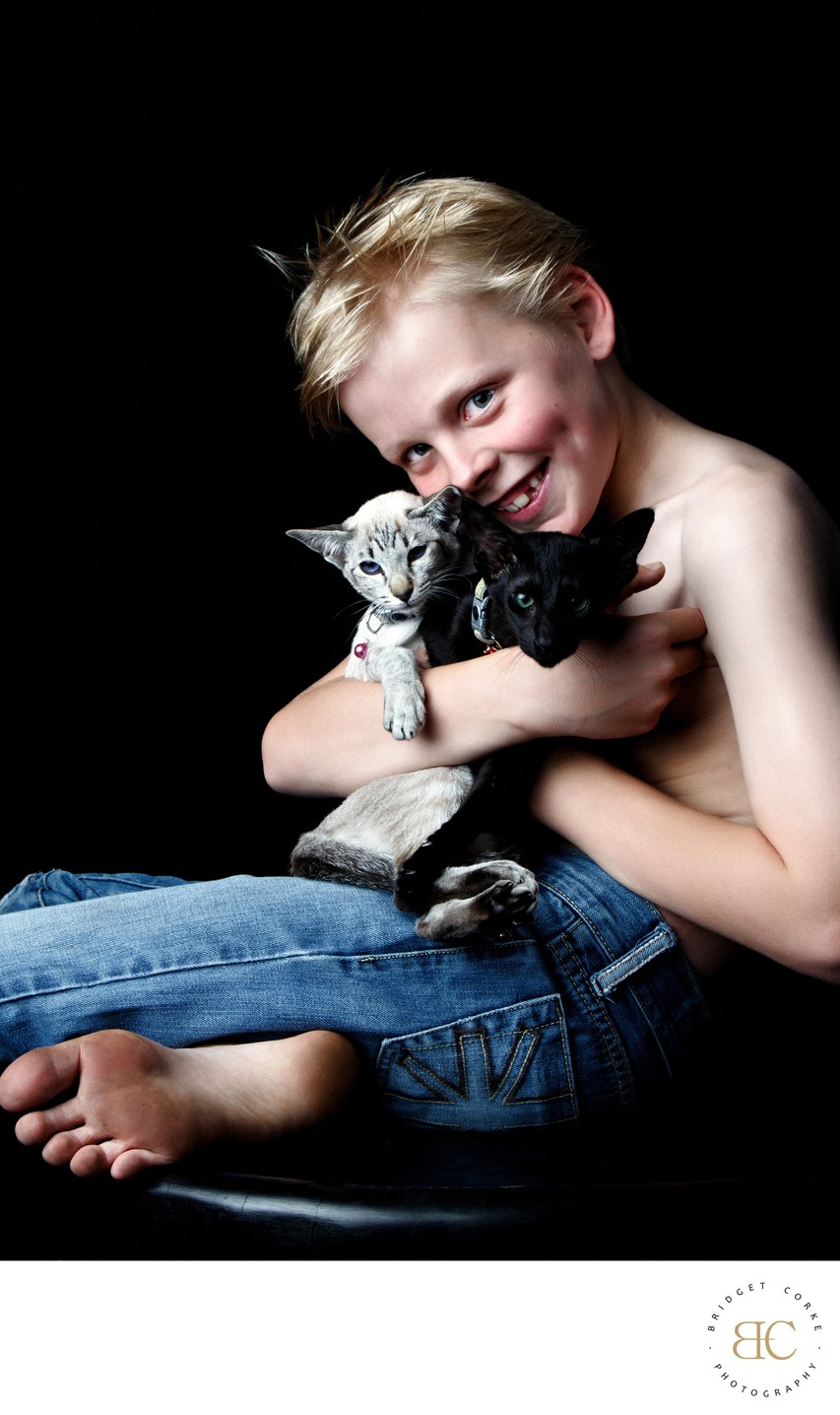 Boy With Siamese Black Oriental Kittens