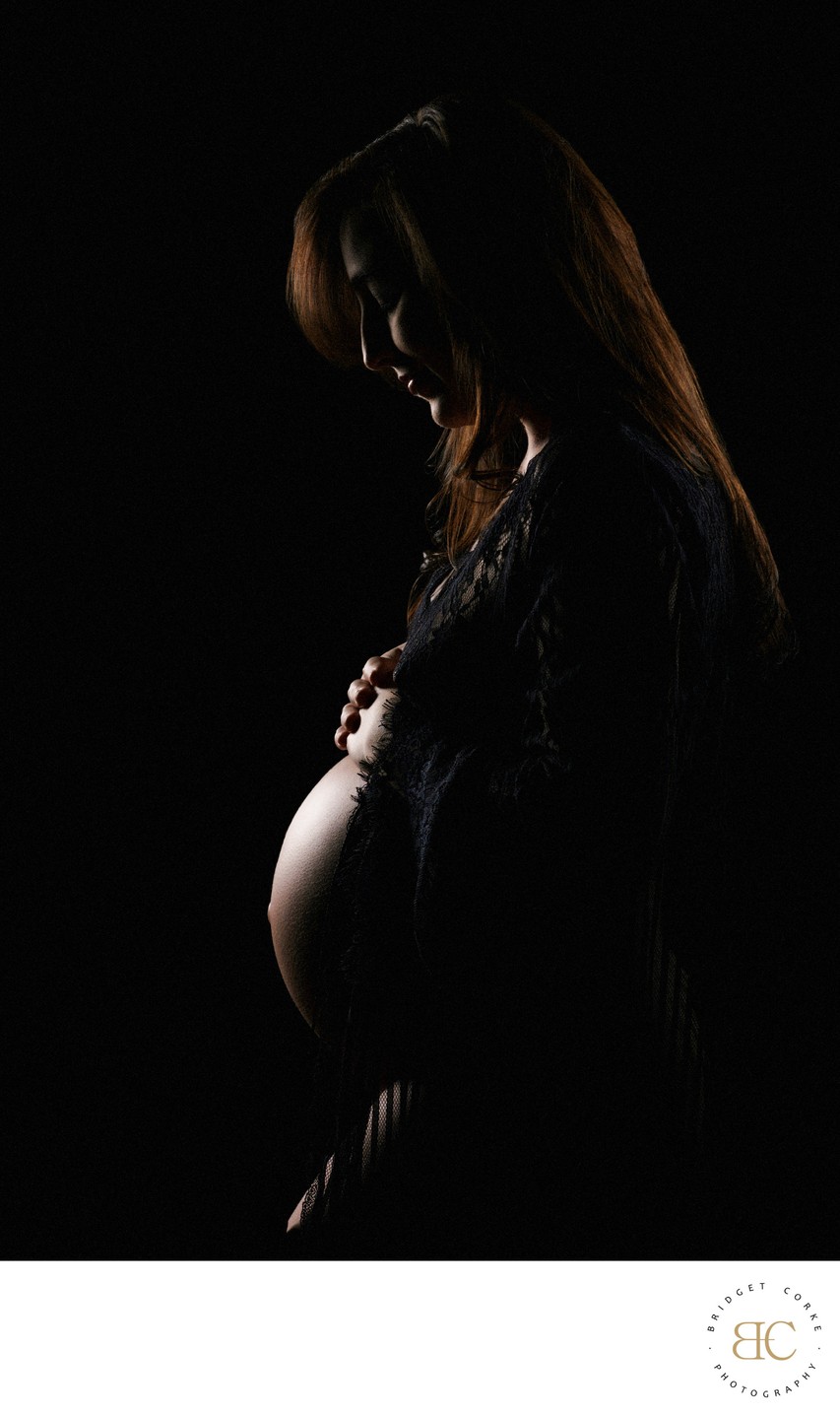 Artistic Maternity Silhouette with Soft Lighting