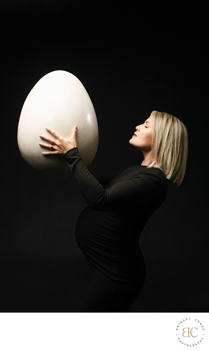 Creative Maternity Portrait with Symbolic Egg