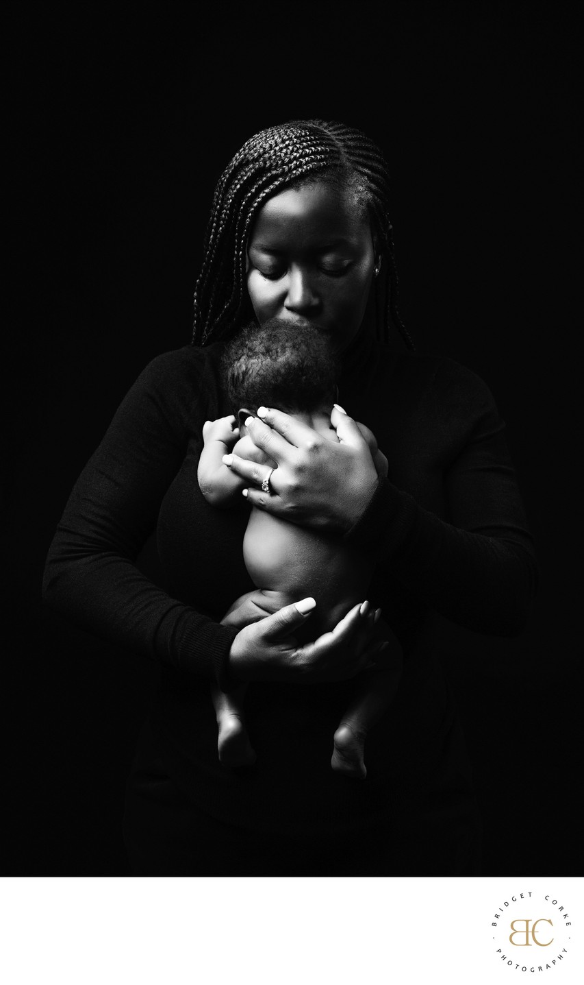 Mother's Embrace: Newborn Bond in Black & White