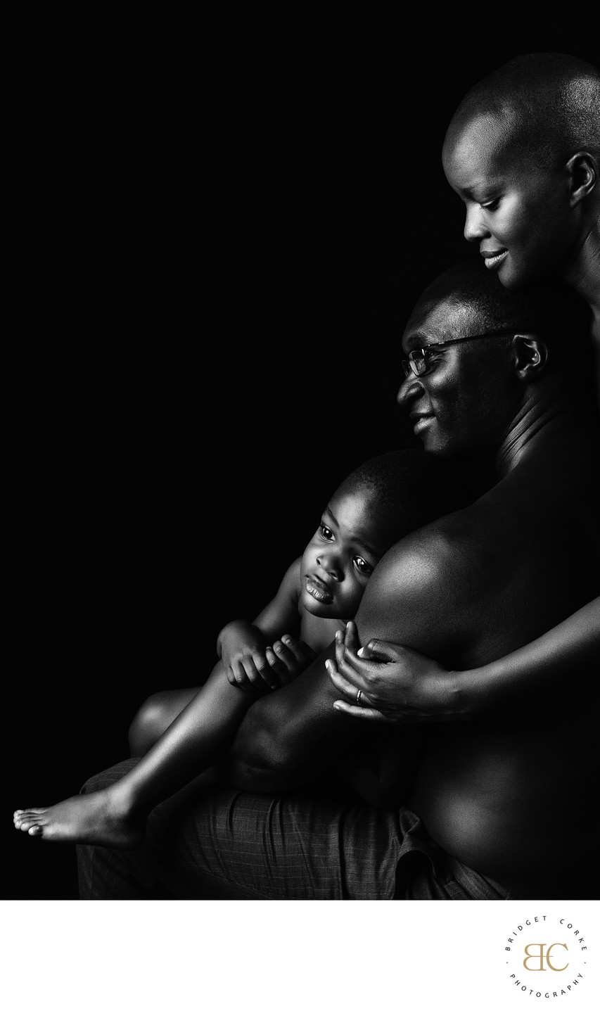 Family Embrace in Monochrome Studio Portrait