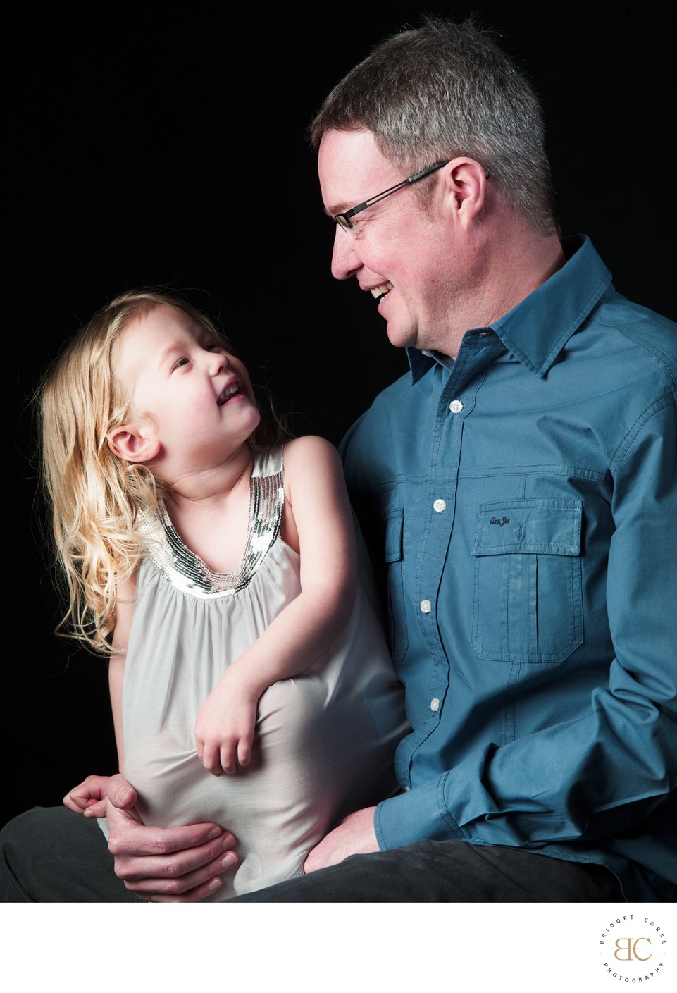 Father and Young Daughter Sharing a Laugh