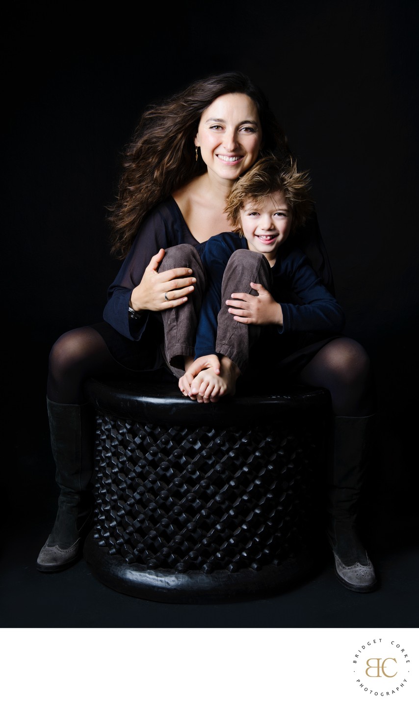 Mother and Son Joyful Studio Portrait