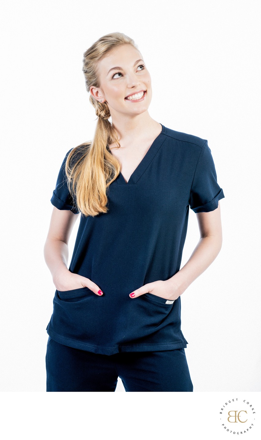 Confident Portrait of a Nurse in Navy Scrubs