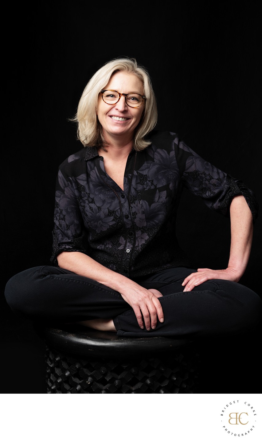 Relaxed Portrait of a Woman in Black Attire