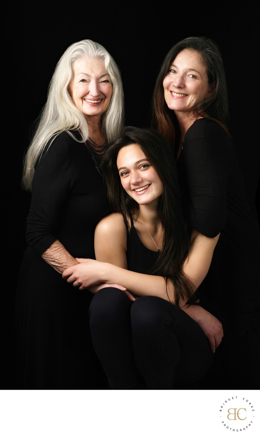 Radiant Three-Generations Mother and Daughter Portrait