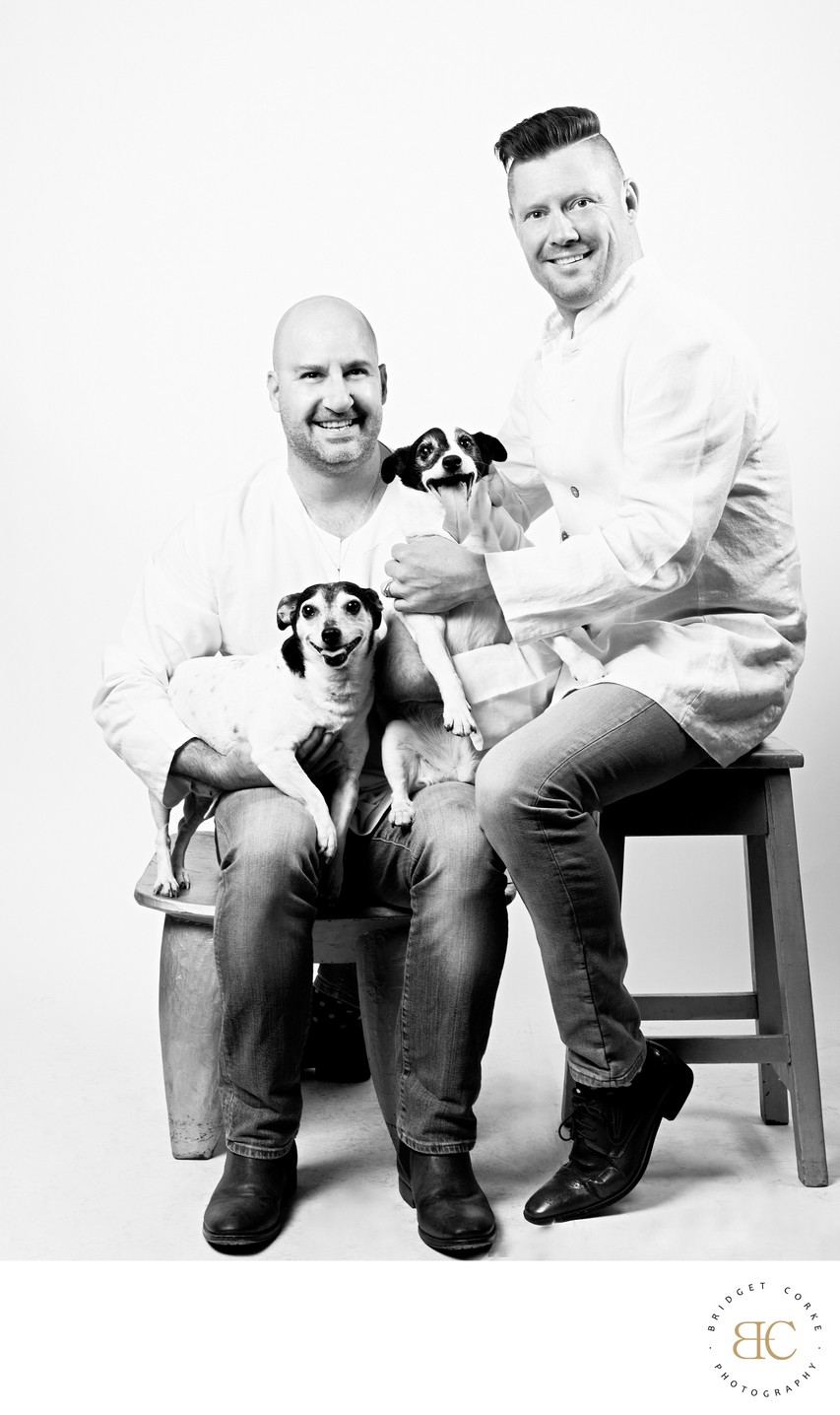 Modern Black-and-White Family Portrait with Dogs