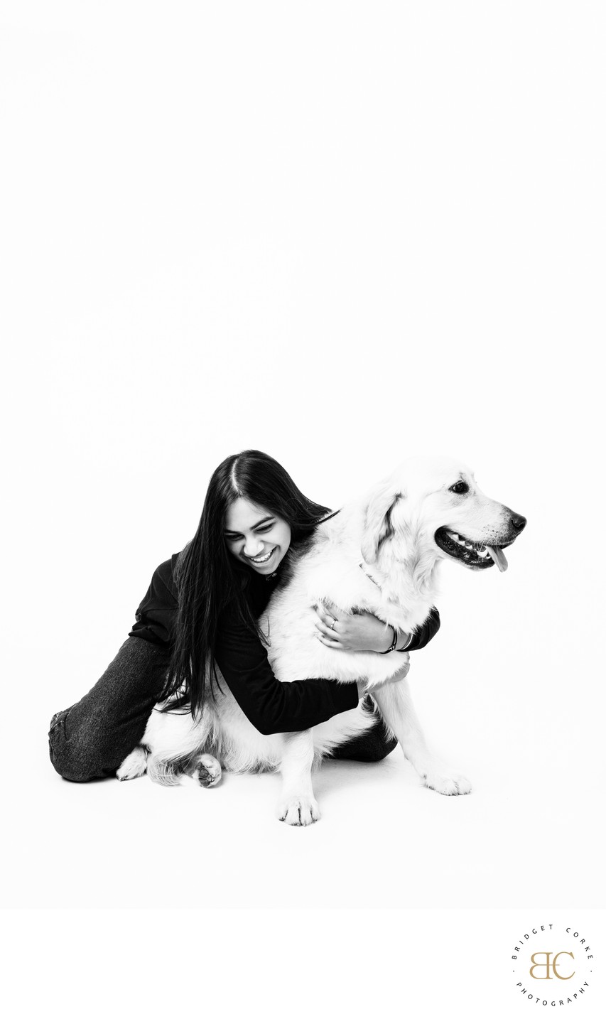 Black-and-White Portrait of Girl and Golden Retriever