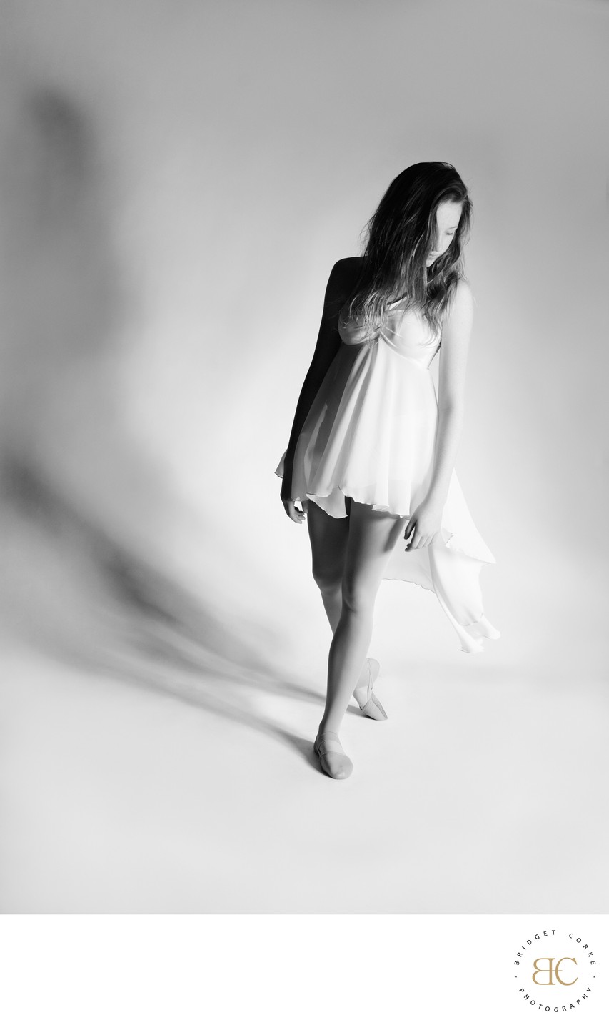 Graceful Dancer in Flowing White Dress