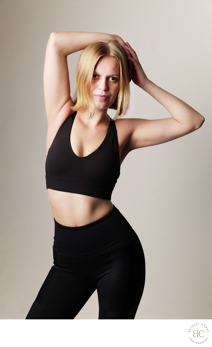 Confident Fitness Portrait in Studio Lighting