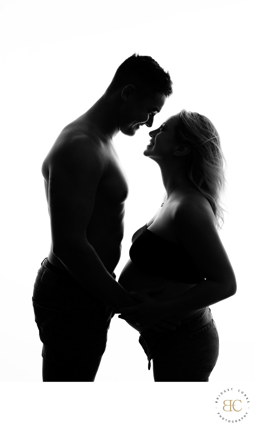 Silhouette of an Expectant Couple in Love