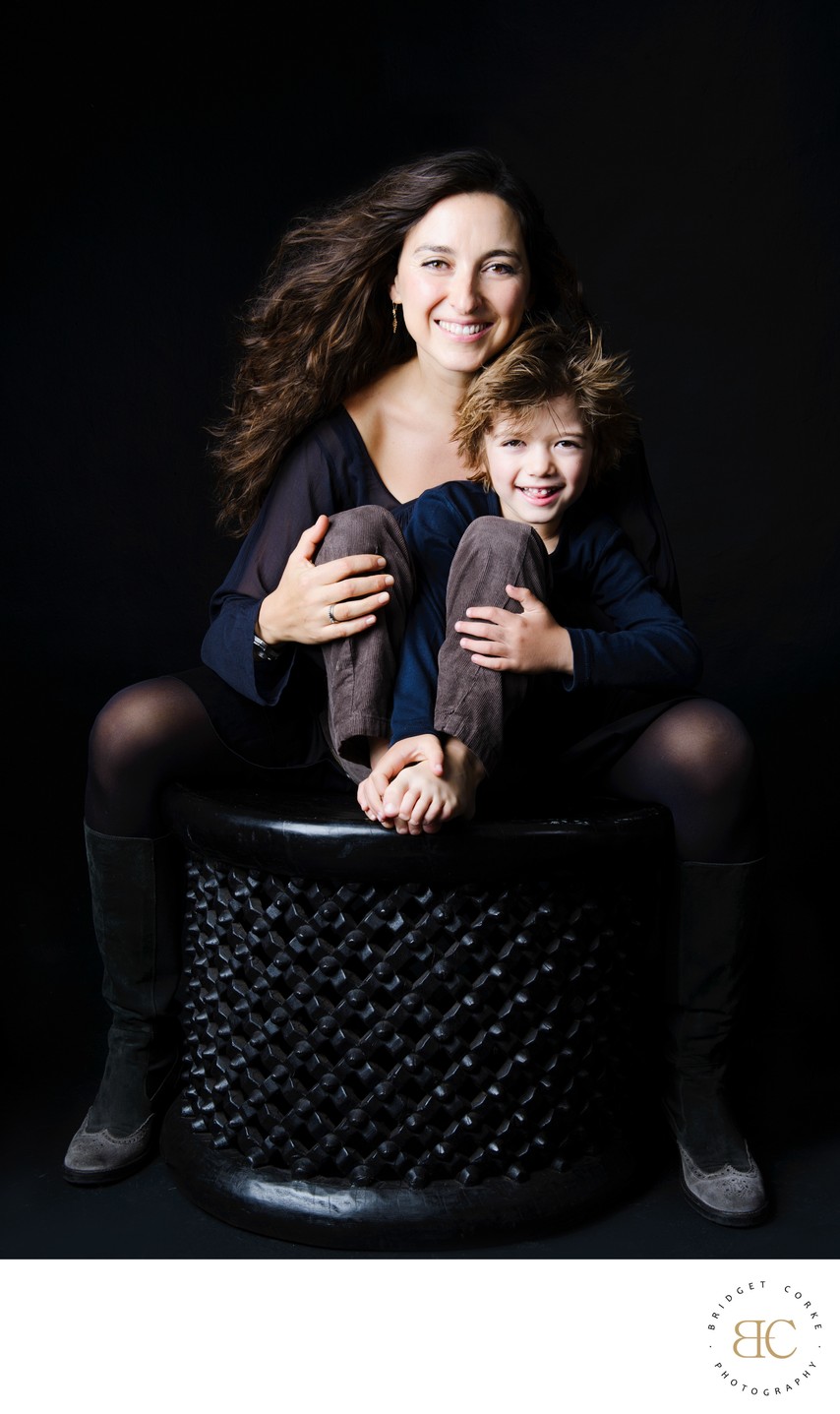 Seated Mum and Son with Windswept Hair