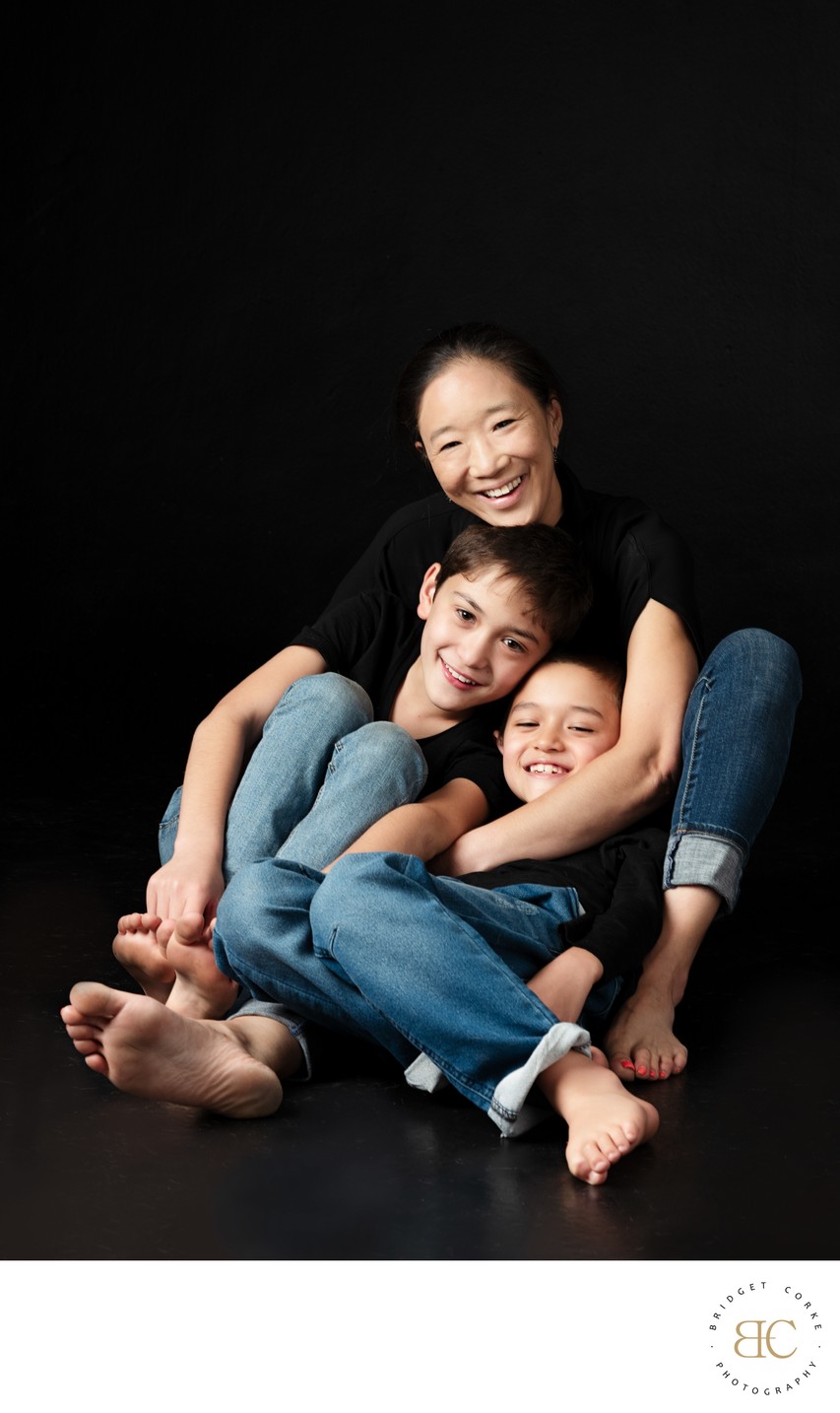 Mum in Black with Her Two Barefoot Boys