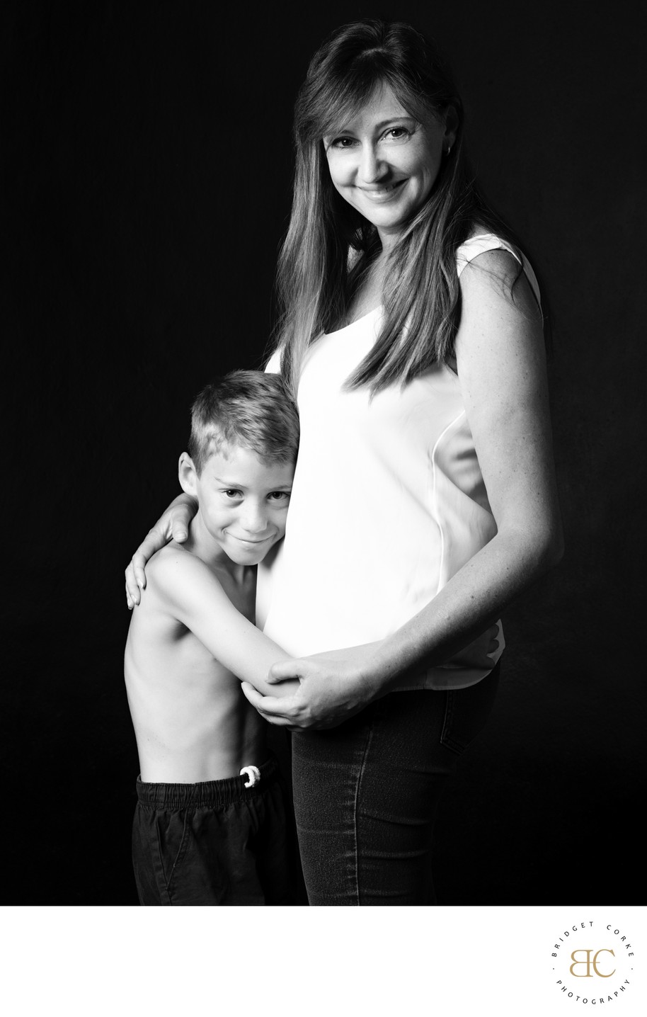 Young Son Hugging His Mum