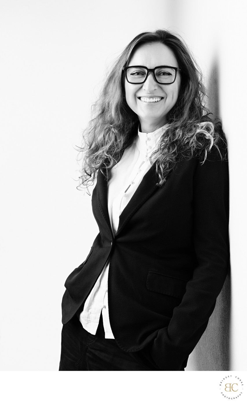 Smiling Woman in Black Jacket Professional Portrait