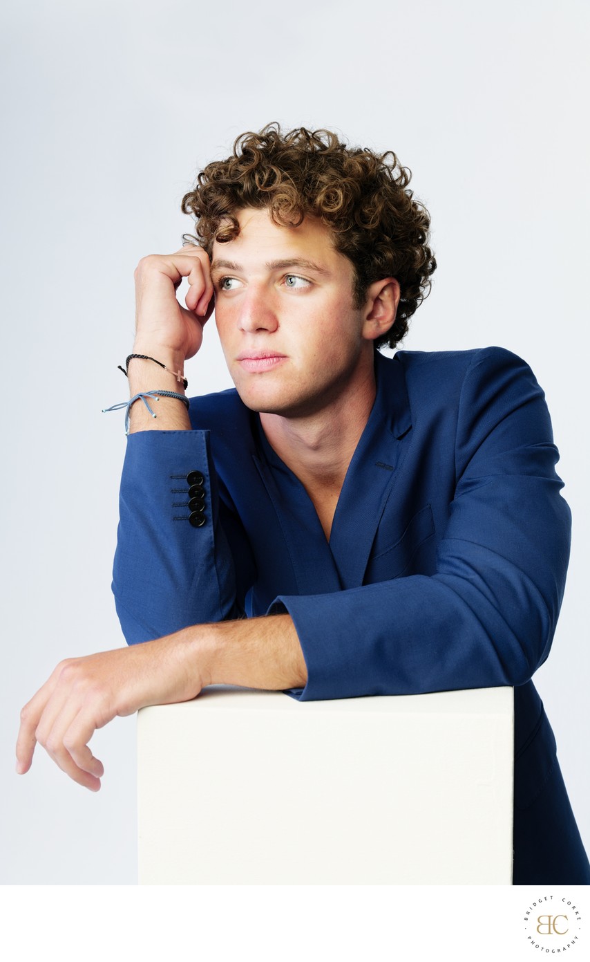 Male Model in Blue Blazer Gazing Away