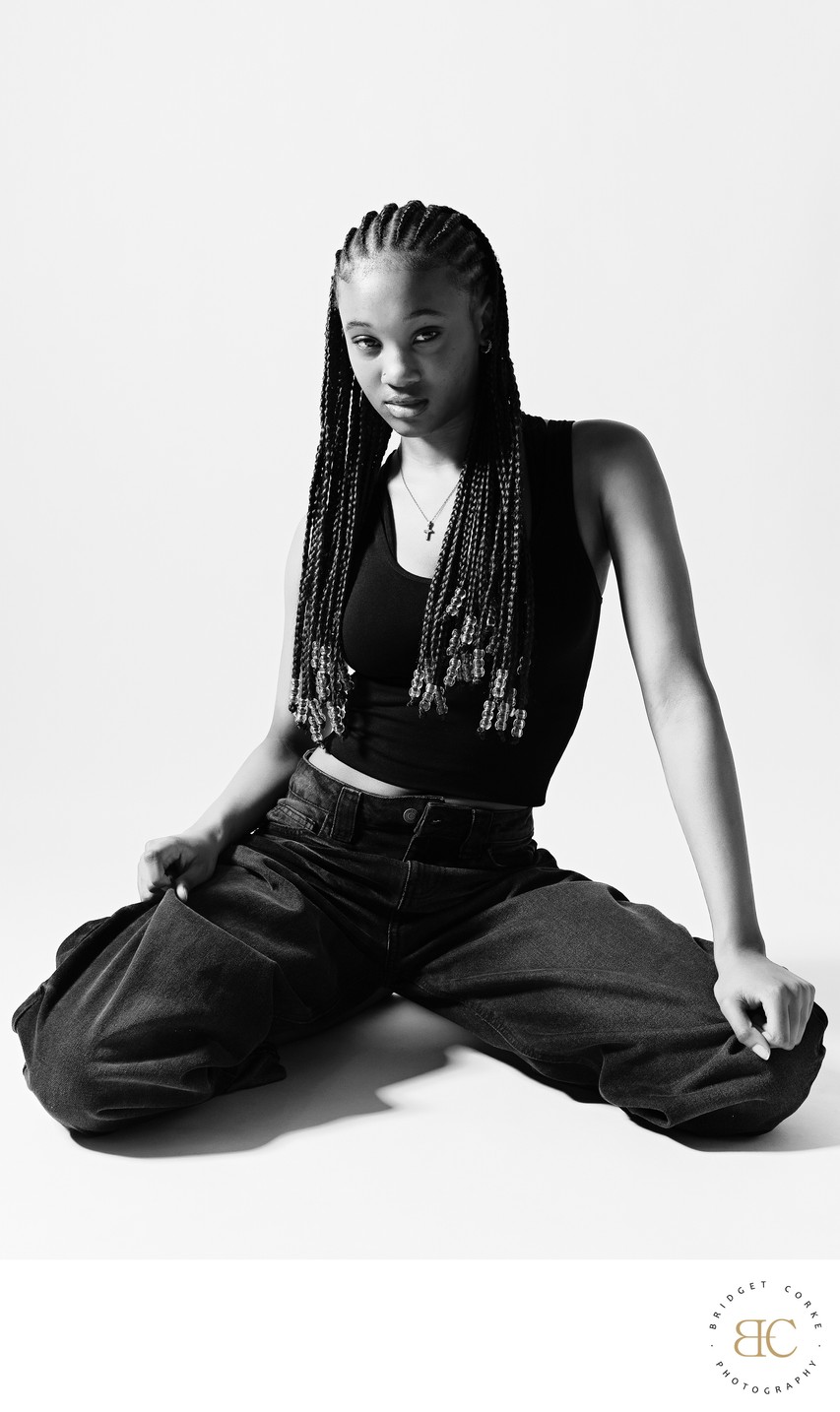 Monochrome Studio Portrait in Black Tank Top and Jeans