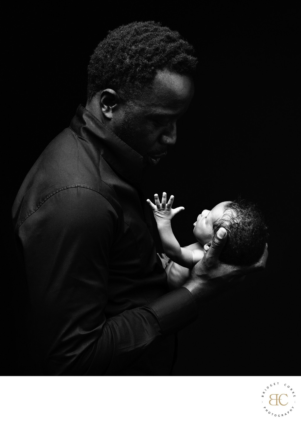 Father’s Whisper: Tender Newborn Connection