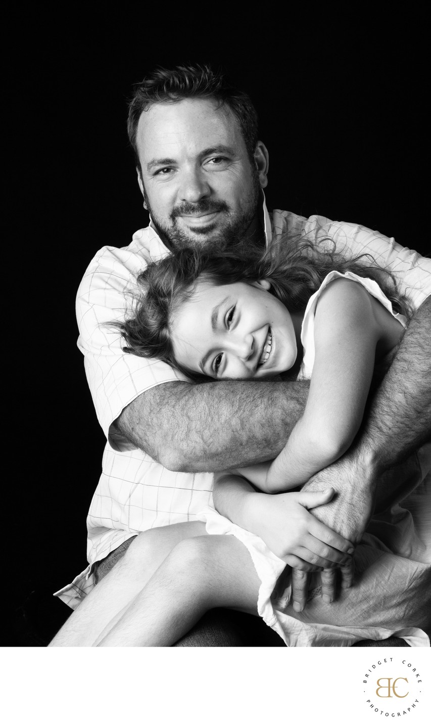 Father Hugging Daughter Portrait