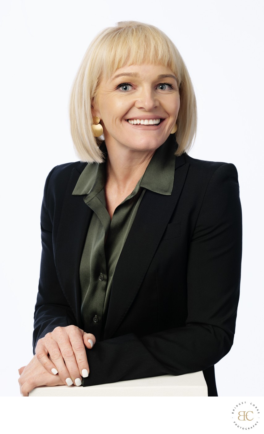 Executive headshot of a woman on white