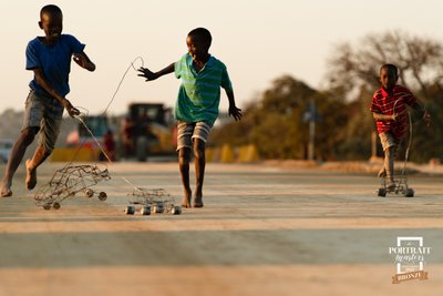 Children Playing Afri Wire Car Photo