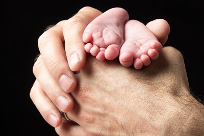 Dad Hands &  Newborn Feet