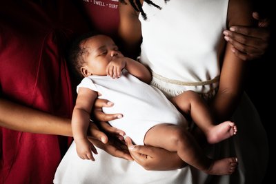 Newborn Sleeping Family Arms