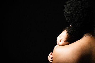 Newborn Sleeping Mothers Bare Shoulder