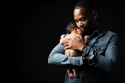 Newborn Sleeping On Dad's Shoulder