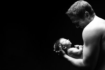 Shirtless Father Newborn