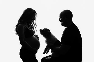 Fluffy Dog With Pregnant Woman & Partner