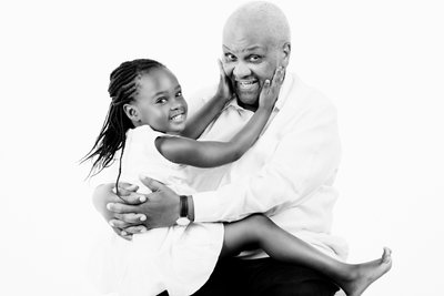 Grandfather and Granddaughter Joyful Embrace