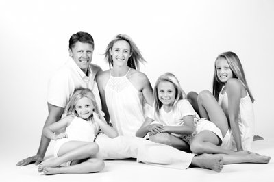 Family in White: A Serene Portrait