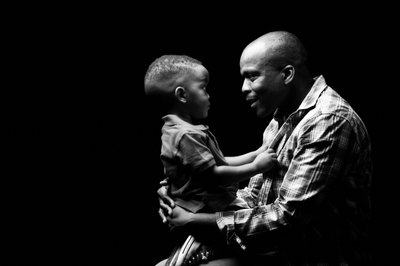 Father and Son Tender Moment in Monochrome