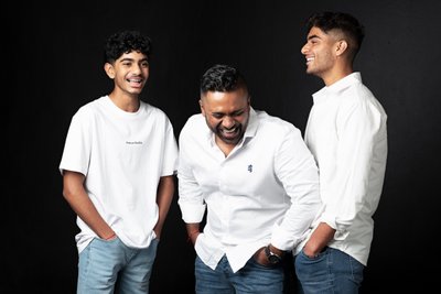 Father and Sons Laughing Together in Portrait