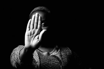 Dramatic Monochrome Portrait with Hand Gesture